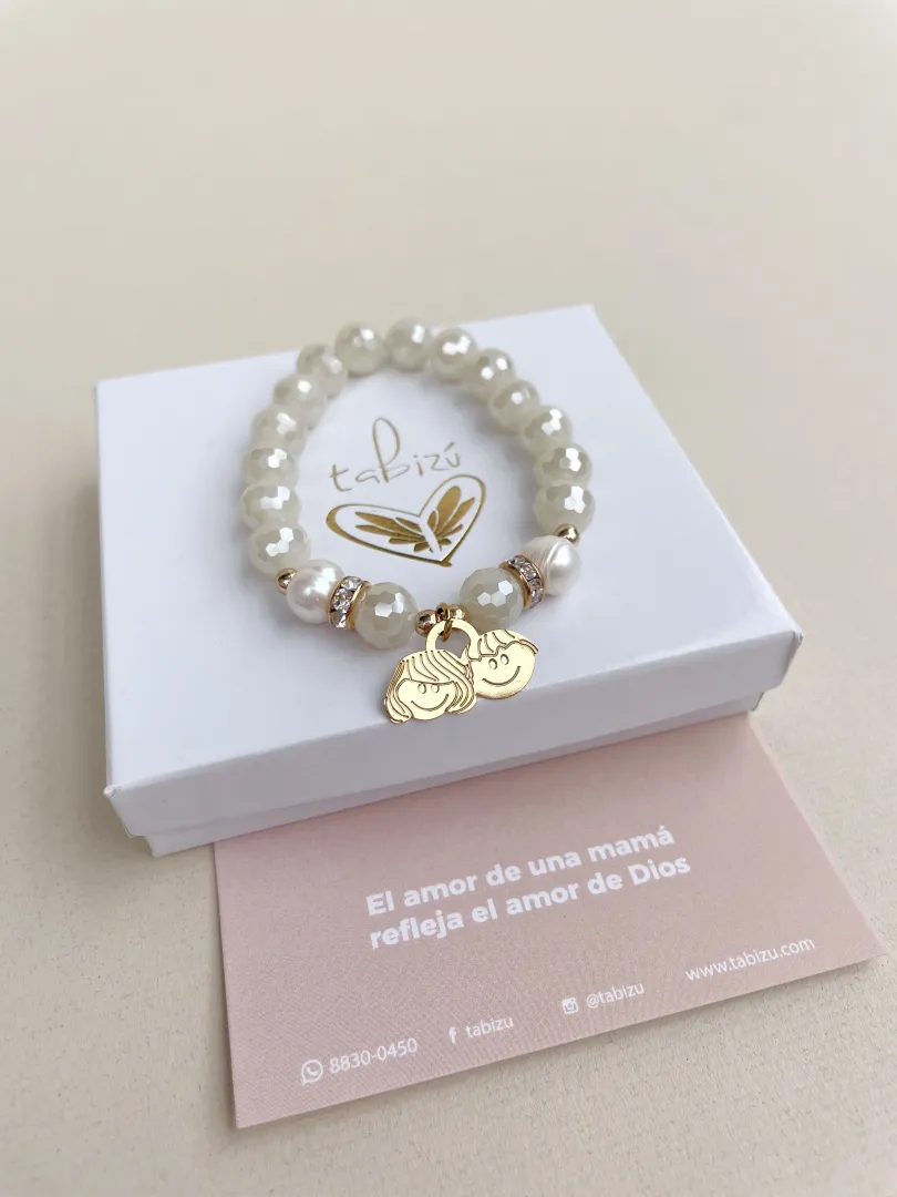 pul49 Pulsera con dije de niño y niña cristales - Imagen 1