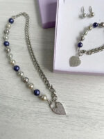 Conjunto pulsera collar y aretes Madre perla facetada