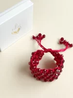 Brazalete tejido con cristales tono rojo/vino - Imagen 2