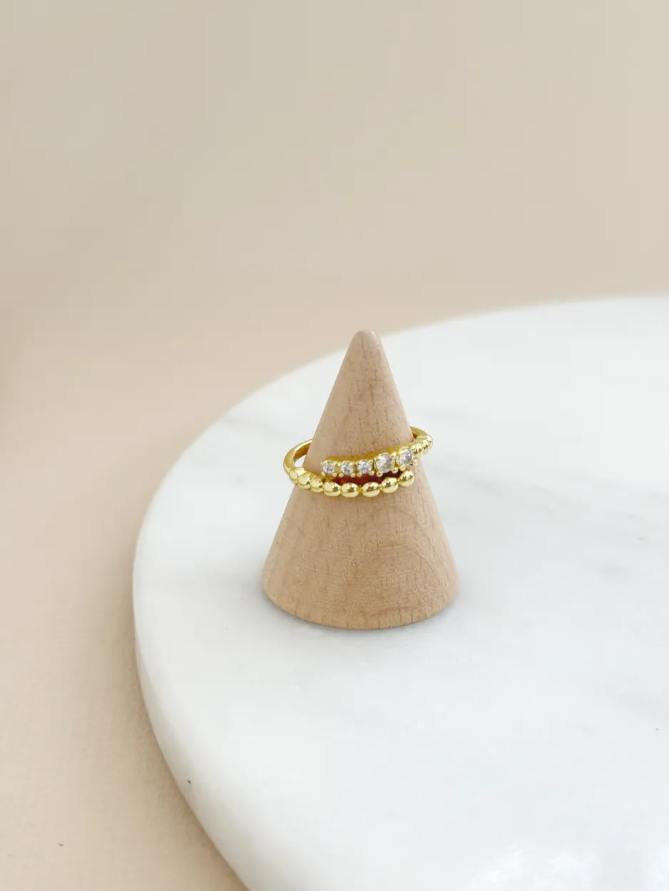 Anillo zirconias y bolitas