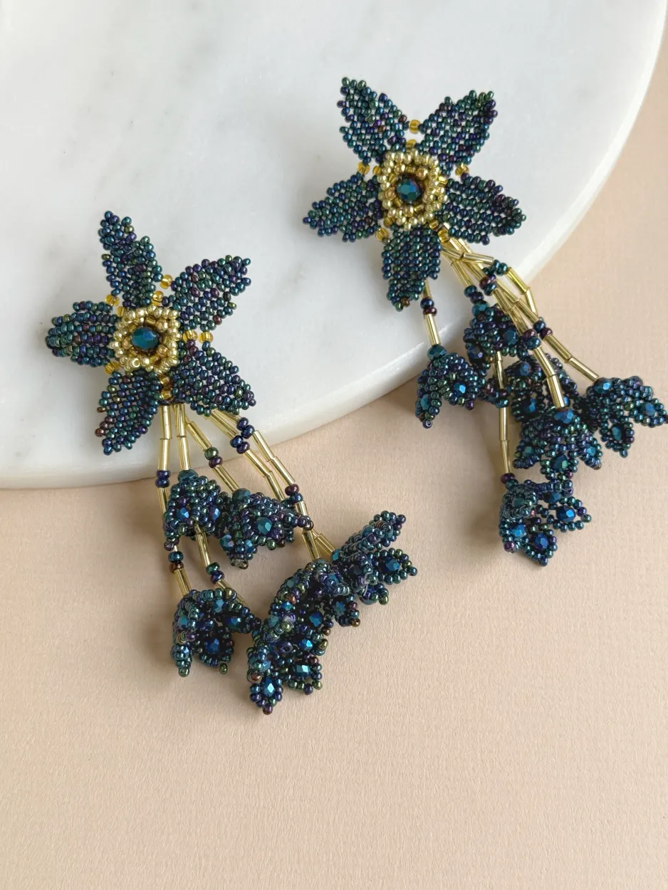Maxi arete flor azul tornasol