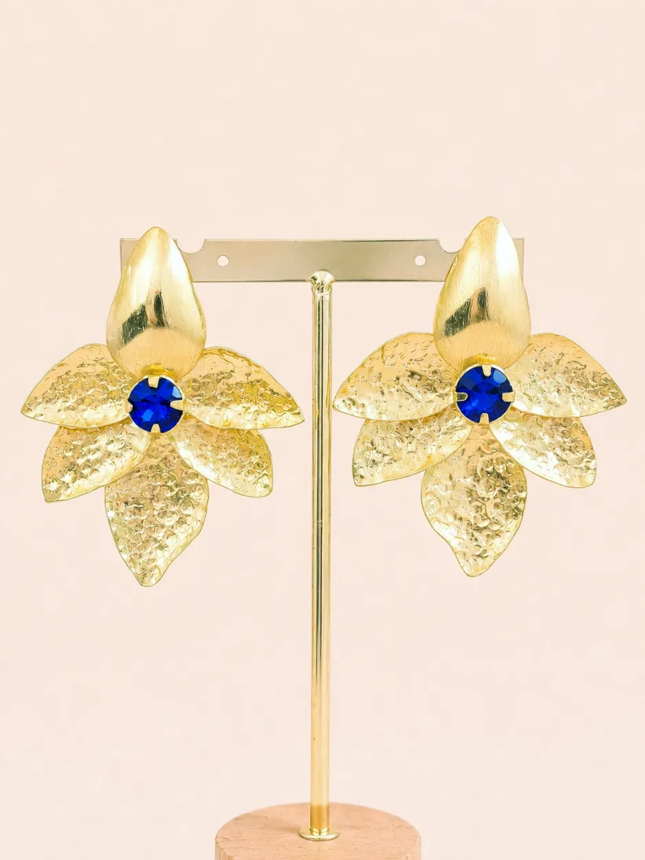 Maxi arete flor dorada cristal azul