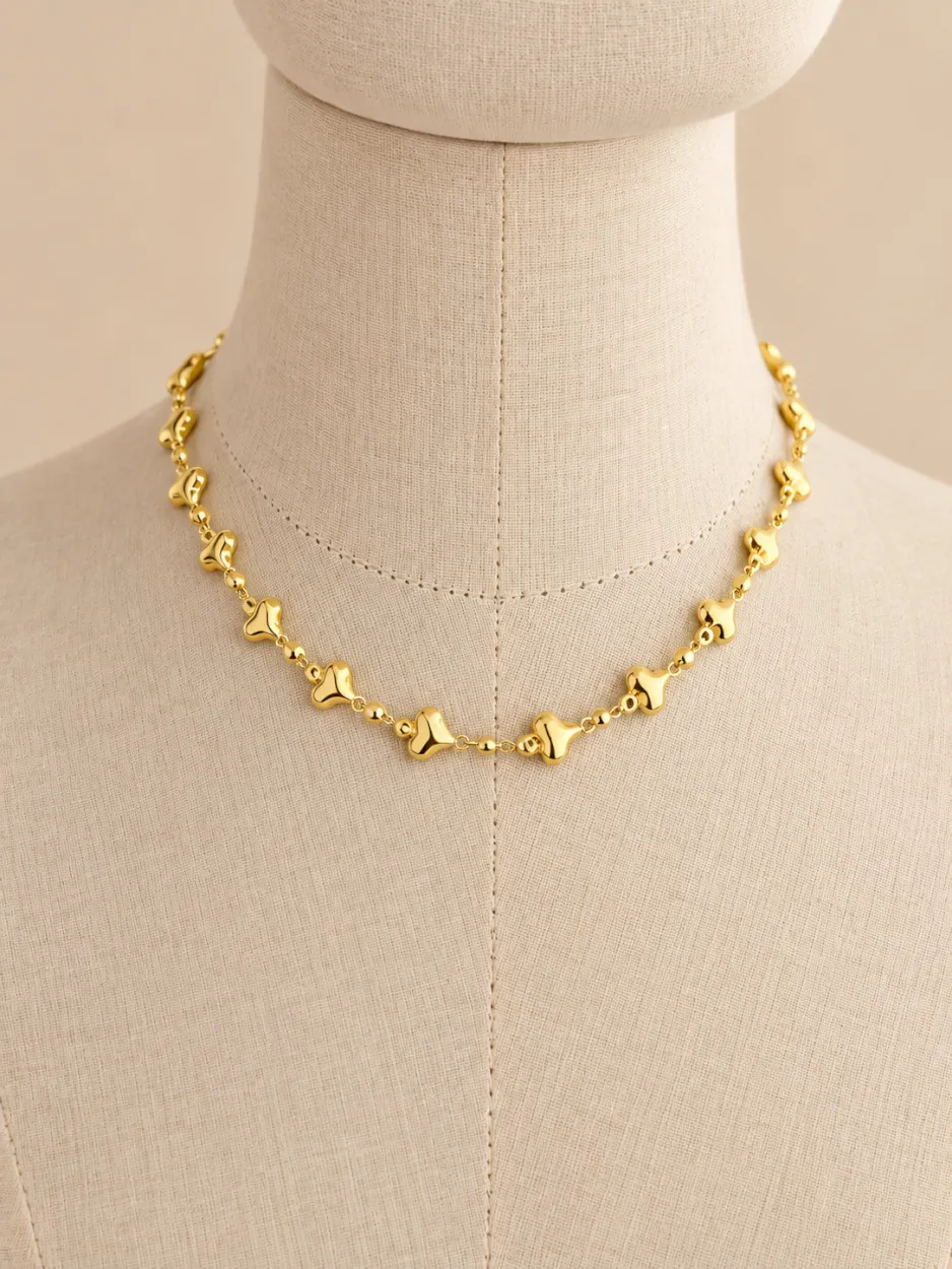 Collar corazones dorado